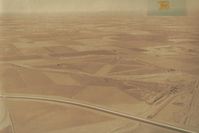  - Tracy airport around 1955-60 (best guess).The city of Tracy (top left)   looks to be no more then 6-8K in population compared to 84,000 and houses almost up to the airport in 2013. View is to the north. - by S B J