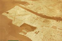  - Alameda around 1955-60 when the SF Bay Area had a heavy military presence. Is the 3 carriers at the bottom of picture where the Doolittle Raiders put on the carrier Hornet? - by S B J