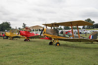  - The Tiger Moth parking area at The De Havilland Moth Club's 28th International Moth Rally at Woburn Abbey Park. August 2013. - by Malcolm Clarke