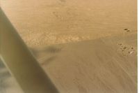  - Most of the Stovepipe Wells airport which consists of only a runway with no facilities.Short walk to the Stove Pipe Wells village. Parking is at the end of runway that can be seen in this picture. - by S B J