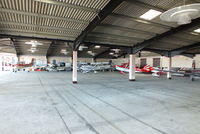  - inside the main hangar at Goodwood - by Chris Hall