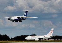  - Inbound traffic is roaring down on rwy 26R observed by outbound traffic at holding point 26R.... - by Holger Zengler