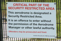  - Sign on fence at Manchester EGCC - you have been warned ! - by Clive Pattle