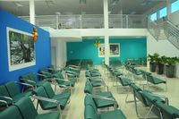  - The American Airlines waiting hall of the Hugo Chavez International Airport of Cap-Haitien  - by Unknown