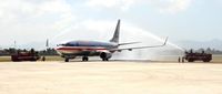  - Traditional welcome of the American Airlines aircraft after landing for the first time at the Hugo Chavez International Airport of Cap-Haitien for the inaugural flight from Miami - by Unknown