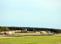  - A view from the hump towards the Tower complex at RAF Leuchars. The fast jet squadrons Nos 1 and 6, with their BAe Typhoons, have already vacated their HAS's and moved to RAF Lossiemouth leaving only the Tutors of the UAS. - by Clive Pattle