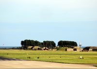  - A view from the hump towards the soon-to-be-closed historical airfield at RAF Leuchars. At the time of the photograph all the resident fast jet squadrons Nos 1 and 6, with their BAe Typhoons, have already vacated their HAS's and moved to RAF Lossiemouth.  - by Clive Pattle