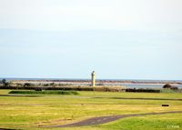 - A view from the hump towards the River Eden on the south side of the airfield at RAF Leuchars. At the time of this photo the resident fast jet squadrons Nos 1 and 6, with their BAe Typhoons, have already vacated their HAS's and moved to RAF Lossiemouth. - by Clive Pattle