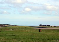  - A view from the hump towards the soon-to-be-closed historical airfield at RAF Leuchars. At the time of the photograph all the resident fast jet squadrons Nos 1 and 6, with their BAe Typhoons, have already vacated their HAS's and moved to RAF Lossiemouth.  - by Clive Pattle