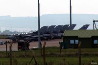 - A line-up of RAF 15 (R) Sqn Tornado GR.4 aircraft on their ramp at RAF Lossiemouth EGQS - by Clive Pattle