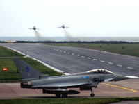  - A shot down runway 09 at RAF Leuchars with a based 6 Sqn Typhoon FGR.4 waiting for the twin 100 Sqn Hawks to clear. In the distance the North Sea is visible. - by Clive Pattle