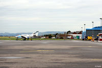  - Wide expanse of apron available at Dundee Riverside. In the distance, looking west,  is a visiting M-KING and on the right the Loganair/Flybe maintenance hangar is visible - by Clive Pattle