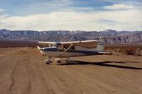  - N6369E in Death Valley in 1992 at the Stove Pipe Wells airport. View is to the south. Be sure to bring your tiedown ropes. - by S B J