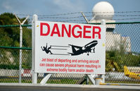  - Warning sign especially poignant when MD-80 aircraft is departing. - by kenvidkid