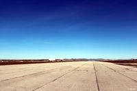  - A long view westwards down the length of the single runway at Port Stanley. - by Clive Pattle