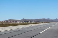  - A long view of the town of Port Stanley taken from the airfield (SFAL). Such is the clarity of the air in the South Atlantic that it is difficult to judge distance. For example the mountains in the background are at least 12km away. - by Clive Pattle