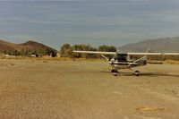  - 02x at Shoshone showing the short distance to town and the trees that you fly over on short final if landing on runway 15.Runway 33 is upslope with obstructions so a go around can be problematic.Was a fatal acc on a go around on 8-18-73. - by S B J