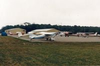  @ Clarion County Airport - N3368E & N89364- A bad weather stop at Clarion,Pa. with several (5) other planes doing the same. They were returning (flying east) from the Oshkosh Flyin in 1989.The red C150 (is 150 hp) was exported to Portugal in 2006. - by S B J