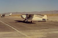  - N39932 at the Baker airport with view to the north and toward Silver Lake. This dry lake has a short but fascinating history as a WW11 training base.It is only a few miles from the Baker airport. - by S B J