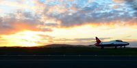  - Sunset seen from the airport. - by Roger Winser