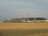  - New construction at YMML seen from opposite side of airport. - by red750