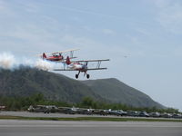  - Aviation Museum of Santa Paula 1st Sunday display day, N66711 and N65124 with smoke in echelon making fast low pass over Rwy 22 - by Doug Robertson