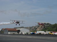  - Aviation Museum of Santa Paula 1st Sunday display day, N65124 with smoke and N66711 in echelon formation making fast low pass over Rwy 22, Bravo Zulu guys! - by Doug Robertson