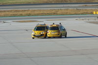  - Two Follow Me vehicles having a chat.  - by Guitarist