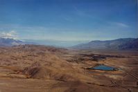  - Lone Pine which is on the south side and almost in the small town so it is hard to see. Runway is at the extreme right of pic. View is north.Excellent glider country.  - by S B J