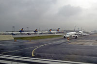  - A look back at LH's base while we are lining up on runway Startbahn West on this dark December morning - by Micha Lueck