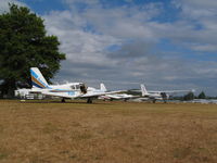  - view of grass parking area next to café.
Three sunair planes - visiting or possibly for sale? - by magnaman