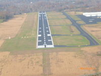  - Short final for runway 04. FBO, SS, Hangars all on the right side of airport.  - by Mark Dymond
