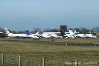  - four BAe 146's and a B737 in storage at Cranfield - by Chris Hall