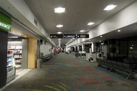  - Early morning, and the domestic terminal is still deserted. - by Micha Lueck