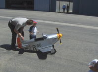  - P-51 MUSTANG Pedal Plane, 3-4 year old power, preflight assist by Builder Dad. NOTE: All upload dates were wrongly changed-these four photos were uploaded on the shot date-hence the many views each. - by Doug Robertson