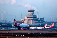  - Running aircraft on rwy 26L, apron and tower in beautiful morning sun... - by Holger Zengler