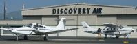  - The Discovery Air hangar with one of Nice Air's Piper Seneca's and Discovery Air's Cessna 206s. - by Chris L.