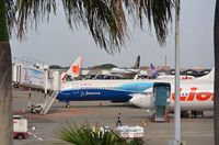  - View from the waving gallery at CGK over a part of the Lion Air terminal 1A. - by FerryPNL
