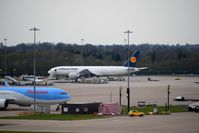  - parked at the cargo center soon to unload cargo then reload more cargo can be seen at the side of the aircraft

photo taken from the top of the carpark - by andy-man-egcc