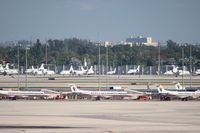  - American Eagle line up with biz jets in background - by Florida Metal