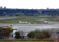  - Looking South-Southeast across the airport at Aberdeen EGPD with a BA A320 taxying to the gate past a parked BAe ATP of West Atlantic Cargo. - by Clive Pattle