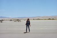  - N4385E (the Aeronca Chief seen in distance) owner taking pictures at picturesque Tracy airport. Not sure many others did-picture taking that is. View is to the south and runway 30. - by S B J