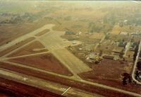  @ O01 - Santa Rosa Air Center was a well used airport by the warbird pilots,so with 7K feet of runway, not having enough runway was seldom an issue.Some large hangars were demolished by the time this picture was taken. - by S B J