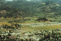  @ O58 - Calistoga Airpark in Calif. If not my favorite airport,it was near the top.So sad when it closed in 1998.A 5 min walk to the tourist busy-yes, but still neat town.What more could a pilot ask for! Notice all the vineyards. - by S B J