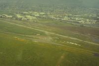 - Sky Sailing airport in Fremont,Ca. in 1991 just befor closure with all hangars already gone.At this time it was only a shadow of its glory days when it was the most active west coast gliderport.View is east. - by S B J
