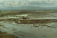  - Fremont airport in Calif. did flood from time to time when Mother Nature was overly generous.South end planes (left) were OK but north end was 3-4 feet deep. Not so good. View is to the SW. - by S B J