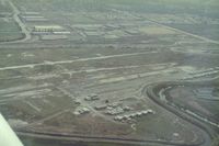  - Fremont airport,Calif. soon after its 1986 closure.Due to the short closure notice and removal of planes and hangars,there were some  angry owners. An X on a runway, I have seen to many in my time. View is east. - by S B J