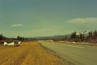  @ 0Q6 -  Shingletown near its end .Lovely airport east of Redding,Ca.Little used but nice.Rise at the N end helped if not off by then as I saw with a Cherokee .It was very close! Disappeared in dust, so much that I started running to it, but they made it.Somehow? - by S B J