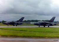  - A pair of Tornado GR.1's lined up for take off at RAF Lossiemouth EGQS. On the left is a 617 Sqn and on the right a 15 R Sqn machine. - by Clive Pattle