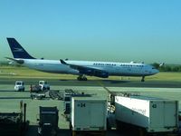  @ Ministro Pistarini International Airport (Ezeiza International Airport) - Airbus 340 LV-BIT entering to Aerolineas Argentinas platform where catering and luggage cars are waiting - by confauna